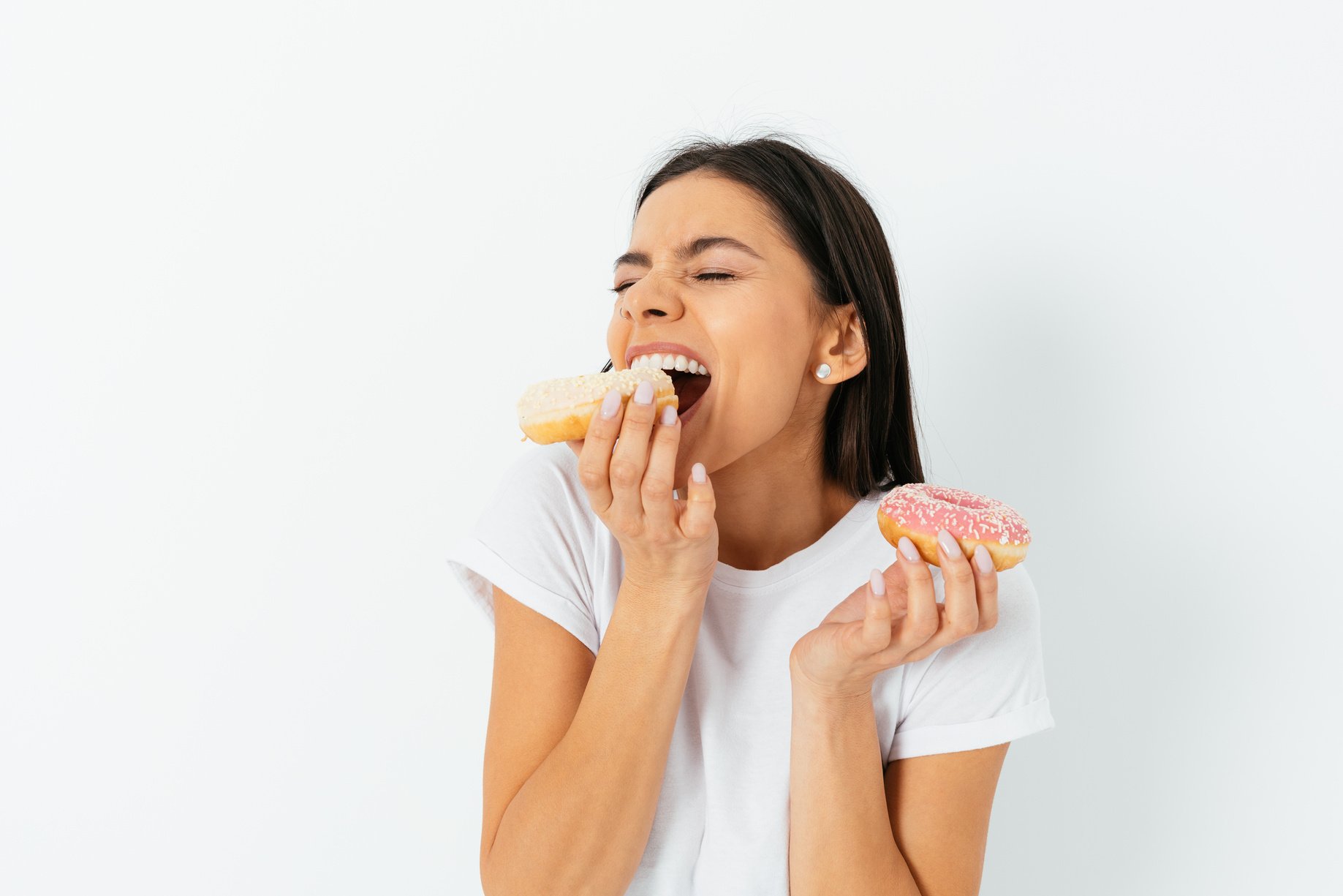 Woman Eating Donuts